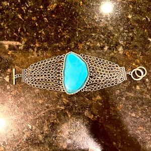 Massive faux turquoise piece costume jewelry bracelet.